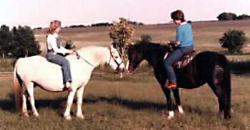 Lithgow Wishnik and Bristol Serendipity on a trail ride rubbing noses